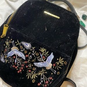 Black velvet backpack with beautiful embroidery detail